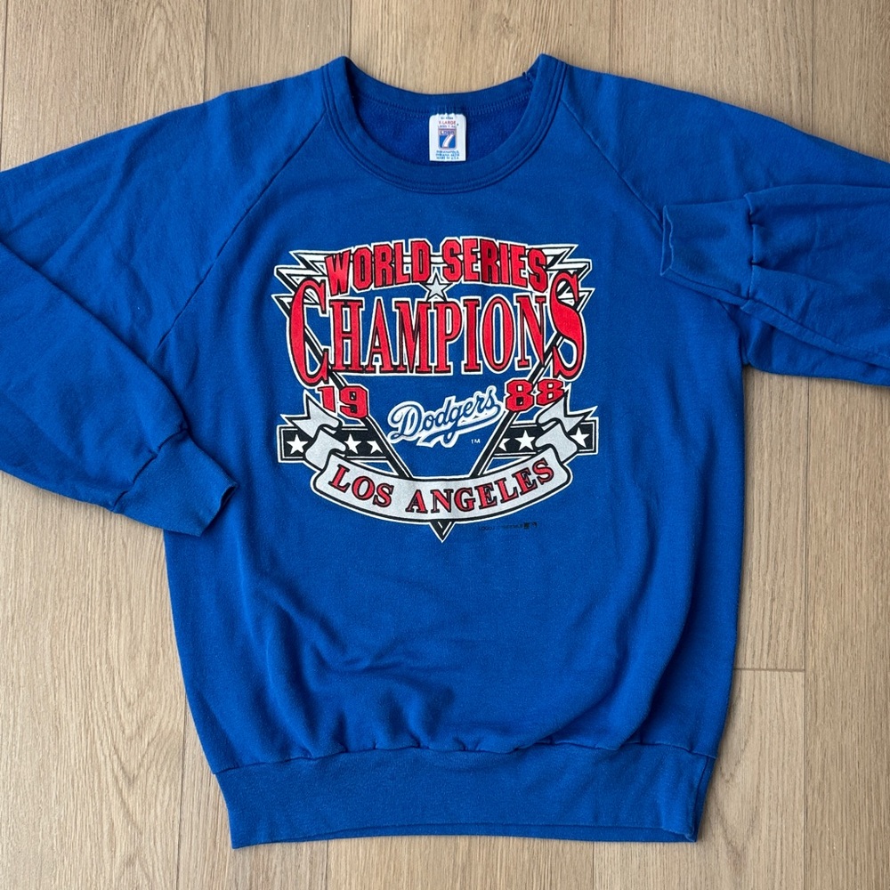 RARE LOGO 7 Blue World Series Champions Crewneck Sweater